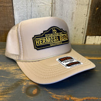 Hermosa BeachARE YOU ESTABLISHED? High Crown Trucker Hat (Khaki)